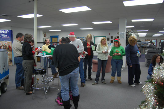 Employees of Basement Systems excited for Secret Santa